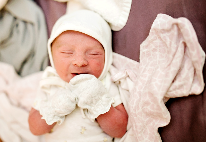 Image of a brand new baby boy ready to go home.