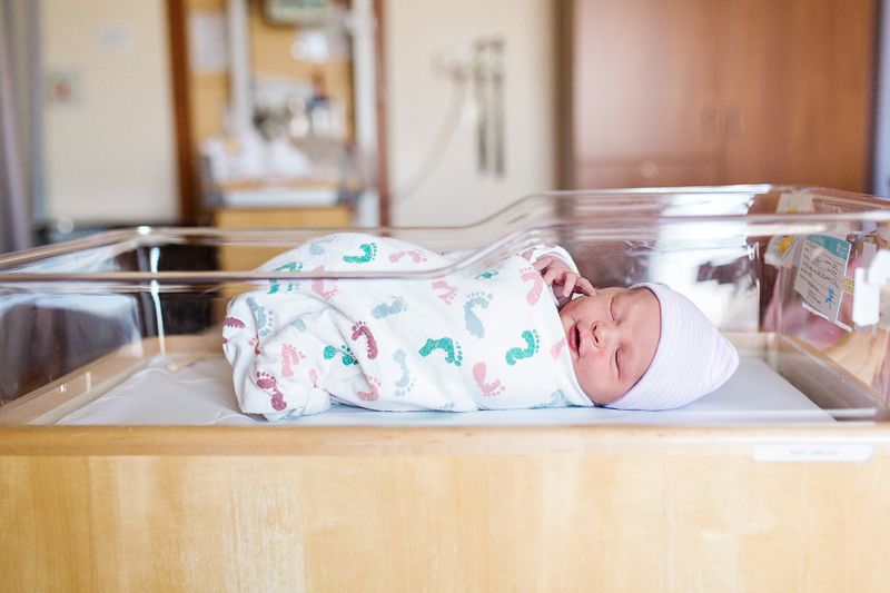 Fresh 48: newborn baby boy in hospital bassinet